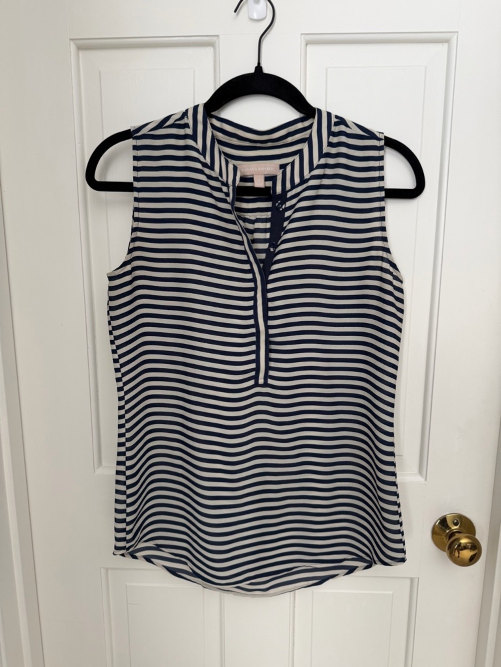 Sleeveless Navy and Cream Striped Split-Neck Blouse